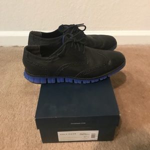 Black Cole Haan wingtip dressy sneakers